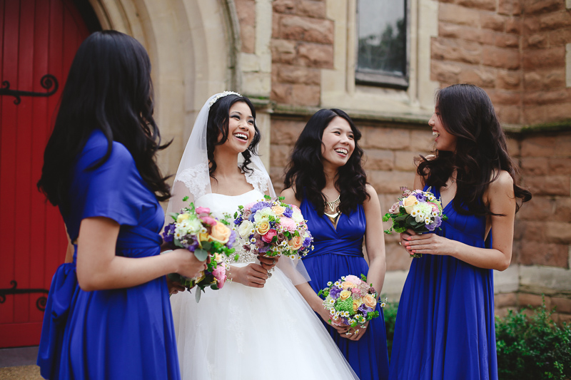 bride with bridesmaids at St Pauls in London by Love oh Love photography