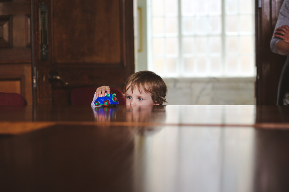 playing with cars at wedding by love oh love photography