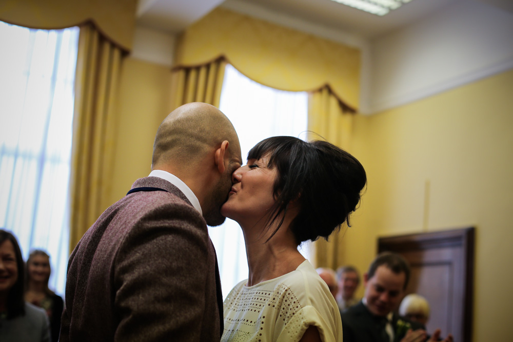 first bride and groom kiss Islington town hall by love oh love photography