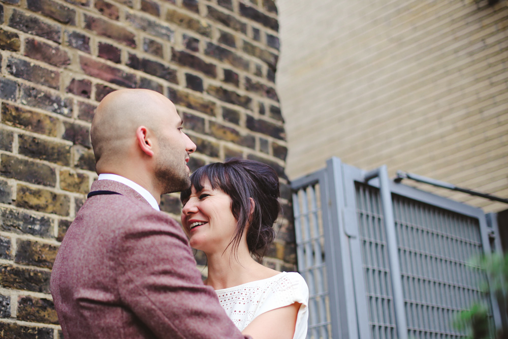 bride and groom laughing by love oh love photography