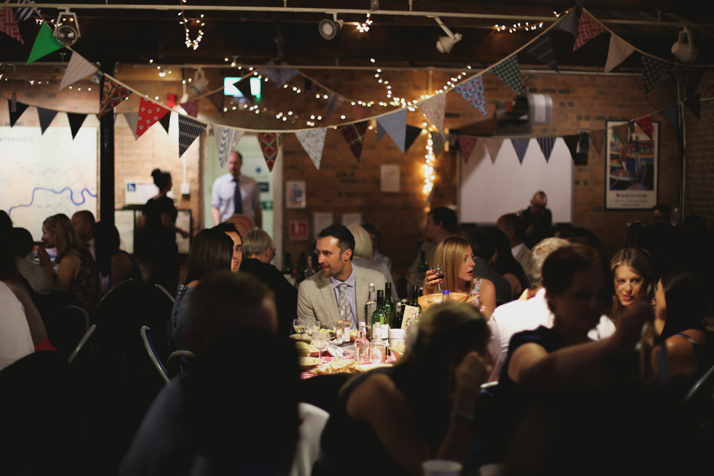 guests and bunting at a vintage wedding